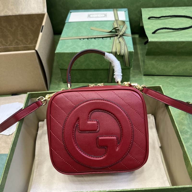 G*u*i top handle bags